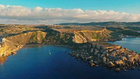 Drone view of sunset point. Ghain Tuffieha beach, Malta Видео 323855024