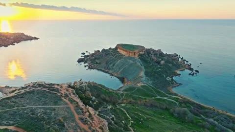Drone view of sunset point Ghain Tuffieha beach, rocks. Malta island Stock Footage 323855550