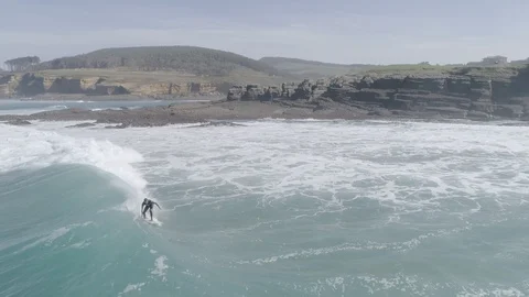 Drone view of surfer in Spain Stock Footage 111979825