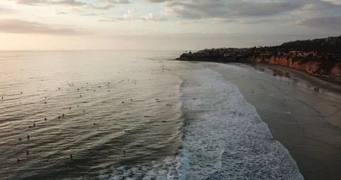 Drone View - Surfers at Sunset In San Diego, Pacific Beach California Видео 95905919