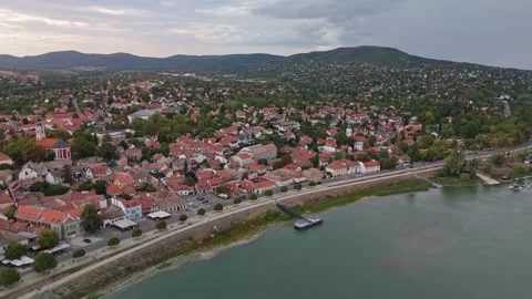 Drone view of Szentendre's Danube waterfront and red-roofed town, Hungary. Stock Footage 346704971
