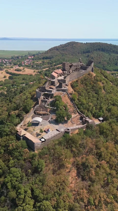 Drone view of Szigliget Castle ruins on hill above Lake Balaton in Hungary Stock Footage 345975945