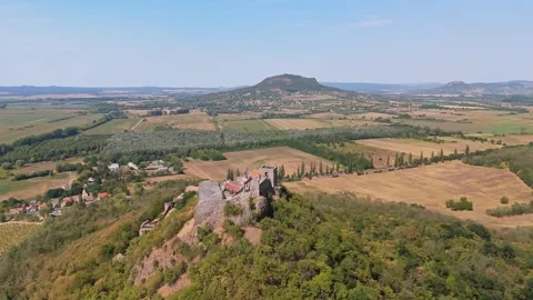 Drone view of Szigliget Castle ruins and vineyards by Lake Balaton Hungary Stock Footage 345980925