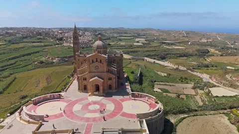 Drone view of Ta' Pinu Basilica in Gozo with surrounding landscape area Video stock 341388023