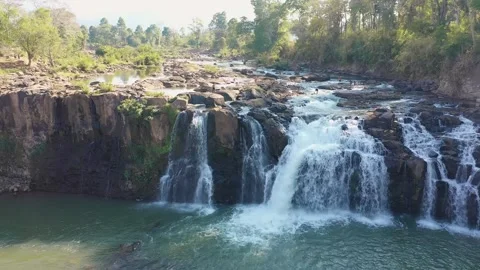 Drone view of Tad Lo waterfall in Boloven Plateau, Laos Stock Footage 247865156