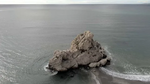 Drone view taking off the beach and flying over the sea away from the beach Stock Footage 119217915