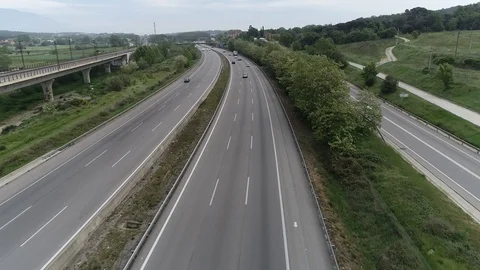 Drone view of three lane highway Stock Footage 111089545