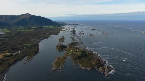 Drone view of tiny islands off Norway rugged ocean shoreline Stock Footage 320731901