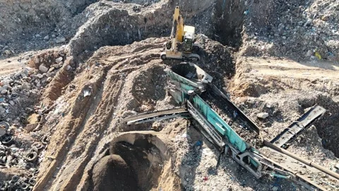 Drone view of a tire recycling facility with a large pile of old car tires Video stock 294722739