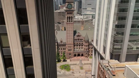 Drone view toward Old City Hall framed by modern towers Stock Footage 328215829