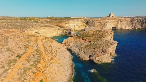 Drone view of Tower and Crystal lagoon, Comino, Malta island Video stock 274806373