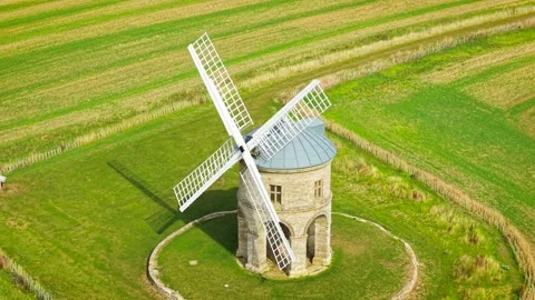 Drone view of traditional stone windmill for flour milling. Historic wheat and Stock Footage 346812136