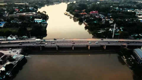 Drone view of the traffic on the bridge during sunset. Stock Footage 209242063