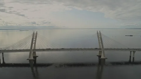 Drone view traffic on cable bridge over sea Video stock 111779987