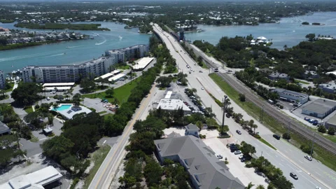 Drone view of traffic going over the bridge in Jupiter Florida Stock Footage 343963796
