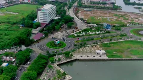 Drone view of traffic at the Tanjung Bunga road roundabout Stock Footage 168116765