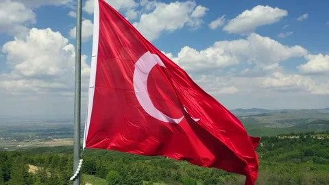 Drone view of turkish flag waving in forest and cloudy sky Stock Footage 232328257