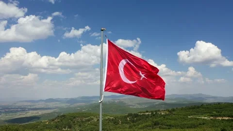 Drone view of turkish flag waving in forest and cloudy sky Stock Footage 232328326