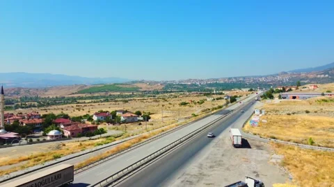 Drone view of Turkish landscape and highway with car traffic along mountains. Video stock 252526155