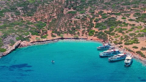 Drone View of Turqoise Bay and Peninsula in Elounda, Greece Stock Footage 333961864
