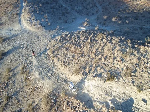 Drone View of two Desert MotoCross riders on single track in the desert Stock Footage 72661550
