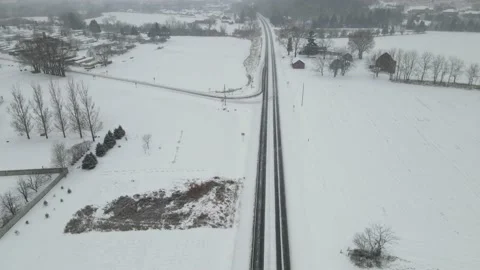Drone view of two lane highway through western Wisconsin Stock Footage 166266912