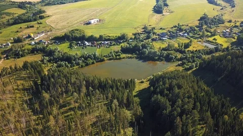 Drone view under green field with road Stock Footage 105274946