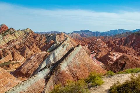 Drone view on unique orange mountain landscape covered with sparse vegetati.. Stock Photos