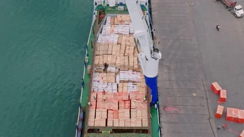 Drone view of Unloading a boat full of w... | Stock Video | Pond5