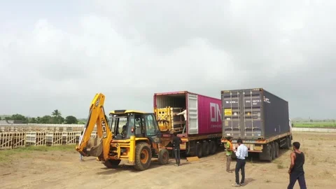 Drone view of unloading solar panel modules from container Stock Footage 314431486
