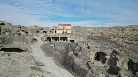 Drone view of Uplistsikhe cave town near Gori, Georgia Stock Footage 273788409