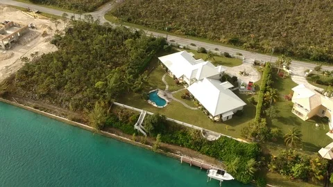 Drone View of Upscale Canal Residences in Lucaya, Freeport Bahamas Stock Footage 100444014