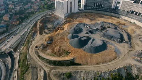 Drone view of an urban construction site with machinery equipment Stock Footage 129068481