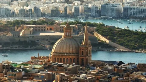 Drone view of Valletta cathedral dome and Manoel fort. Malta Stock Footage 316548174
