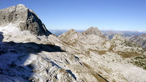 Drone view of a valley in the alps mountains covered by snow Video stock 263498983