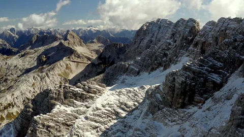 Drone view of a valley in the alps mountains covered by snow Video stock 263499618