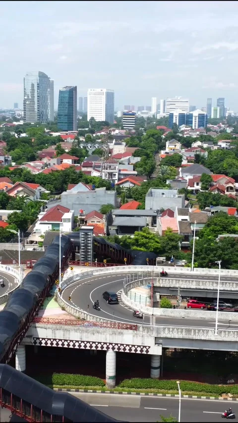 Drone view of vehicles passing over a double flyover Stock Footage 324177061