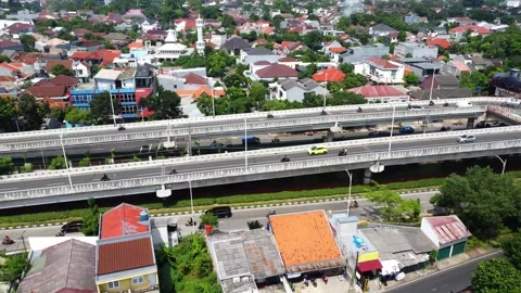 Drone view of vehicles passing over a double flyover Stock Footage 324193549