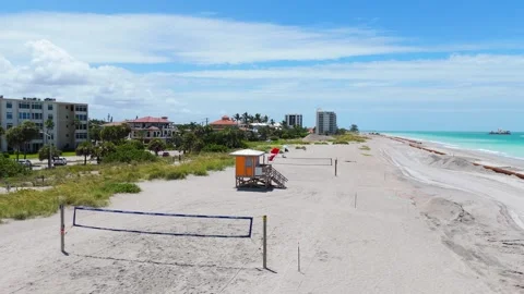 Drone View Of Venice Beach Florida With Volleyball Nets Lifeguard Tower Vídeo Stock 339297759