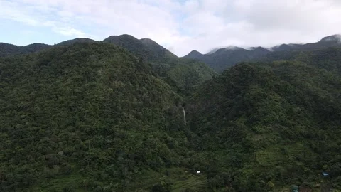 Drone View of Verdant Mountain Range with Hidden Waterfall Stock Footage 298103427