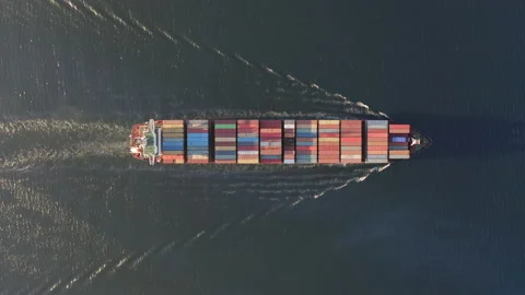 Drone view vertically downward on the movement of the container ship at sea Stock Footage 164554687