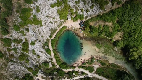 Drone view on very deep river spring in the mountains Video stock 231393674