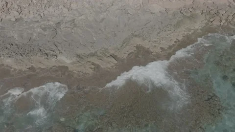 Drone view video waves breaking on the rocks in Mallorca,  D-Log Stock Footage 233377519