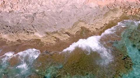 Drone view video waves breaking on the rocks in Mallorca, Balearic Isalands Stock Footage 233377545