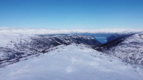 Drone View of Vik i Sogn, Norway from a snow covered Vikafjell. Stock Footage 234513196