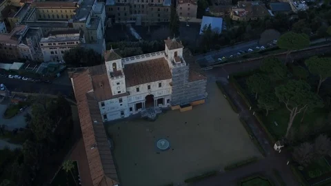 Drone view - Villa Borghese to Vatican City tracking forward - twilight Stock Footage 103635159