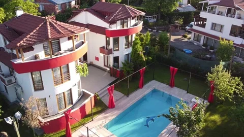 Drone view of villa with pool in the forest Stock Footage 229965674