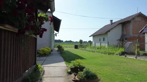 Drone View of Village Yard and Meadow 動画素材 337124785