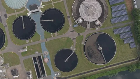 Drone view of wastewater facility, clarifiers and tanks, Netherlands Stock Footage 315857580