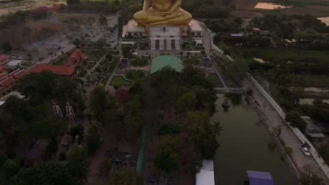 Drone view of Wat Muang’s Buddha at dawn, Ang Thong, Thailand Stock Footage 304659862